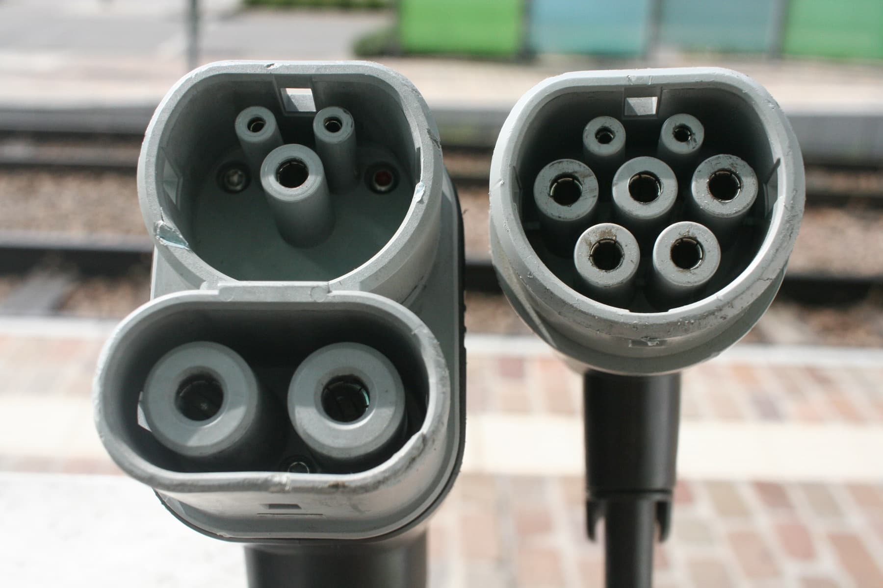 A CCS2 DC connector beside a Type 2 AC connector, the two plugs most Indian four-wheelers charge with.